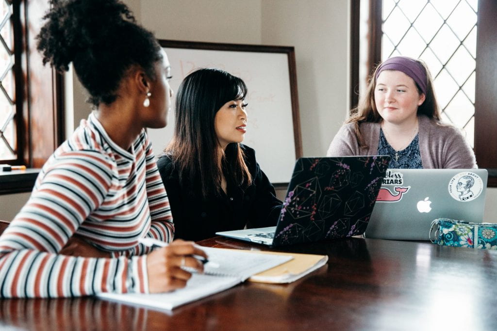 Students discussing course material